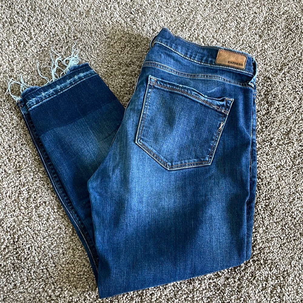 Express Women’s frayed hem, distressed jeans